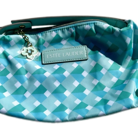 Estee Lauder Handbags - Estee Lauder Blue and White Cosmetic Bag with Textured Design